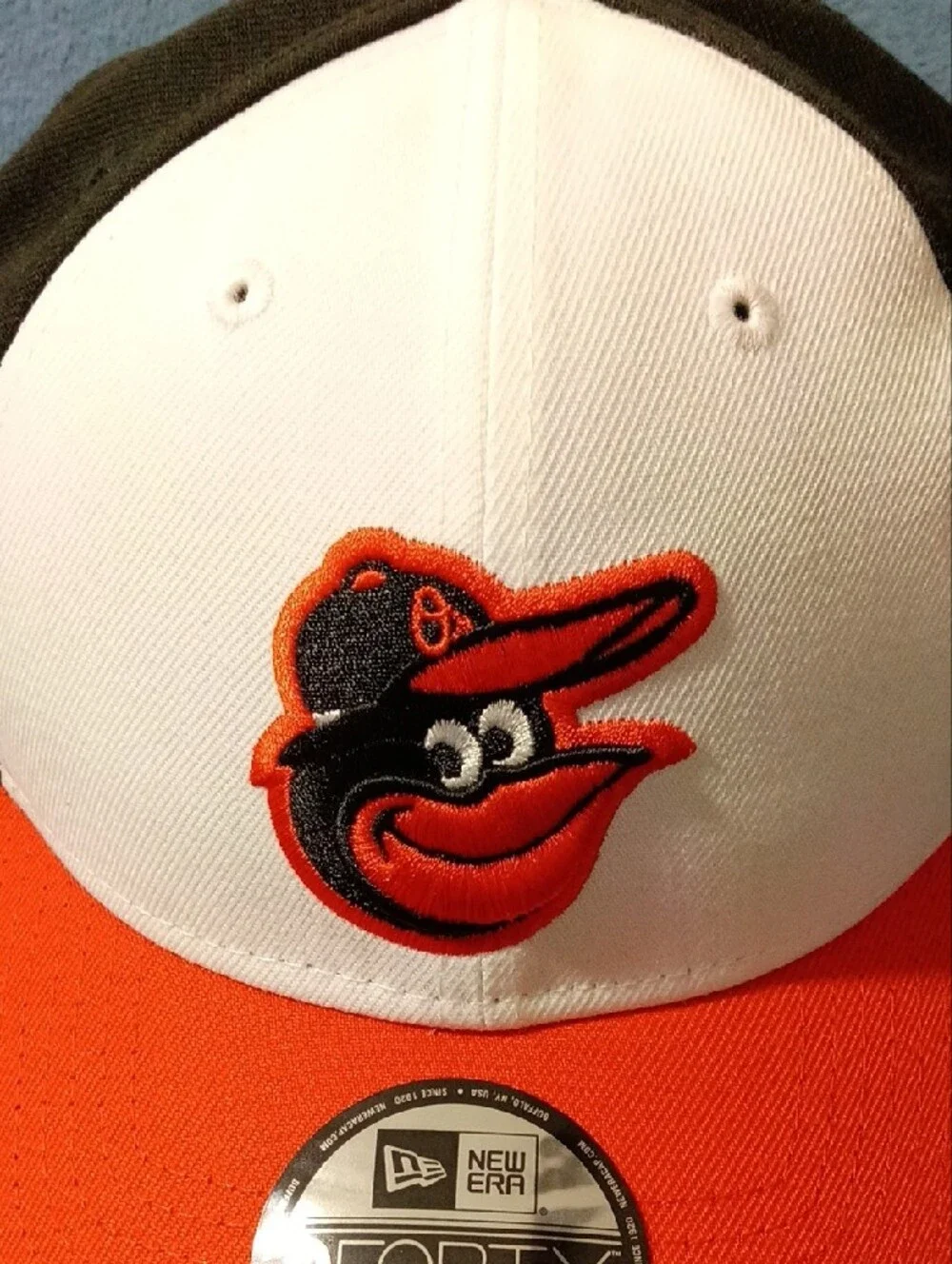 New Era Orioles 9FORTY Cap in White, Black, Orange